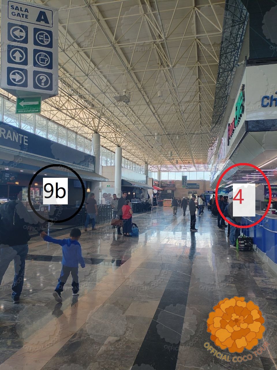 A line of white taxis with orange stripes waiting under the canopy outside Morelia bus station